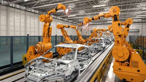 Quatre automobiles en cours d'assemblage par des robots articulés
